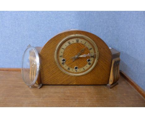 An Art Deco oak mantel clock 