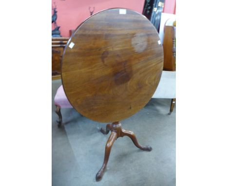 A George IV mahogany circular tilt top tripod tea table 