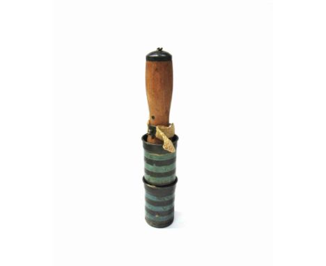 A WWII double head stick grenade, deactivated