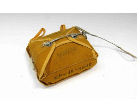 A WWII US Army Air Force "Gibson Girl" survival radio parachute, yellow canvas case with 43 to date to side and markings "Sig