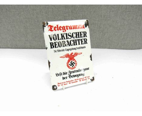 A reproduction Third Reich German Volkischer Beobachter enamel wall plaque