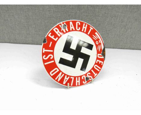 A reproduction Third Reich German Erwacht Deutschland enamel wall plaque