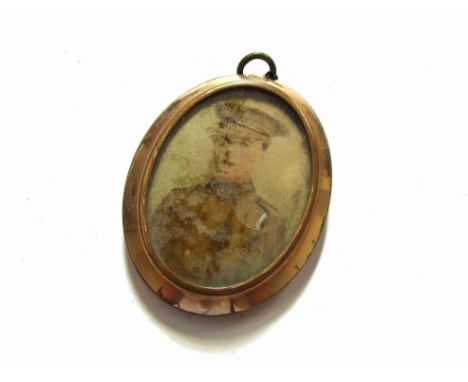 A WWI era hand painted locket with Scottish Regiment Serviceman and officer portraits, rolled gold surround a/f