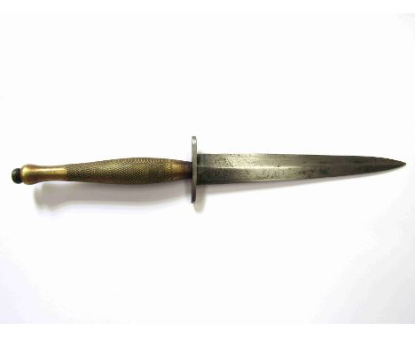 A Fairbairn Sykes second pattern reproduction dagger, steel blade and brass grip 