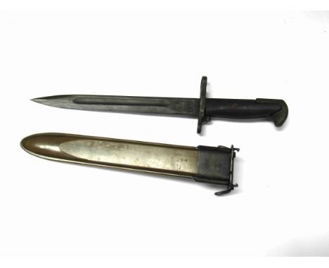 A reproduction US M1 Garand 1942 pattern bayonet with scabbard