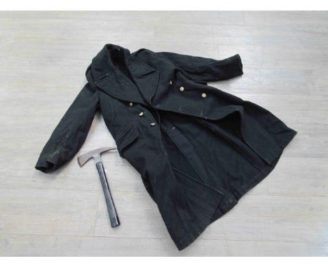 A WWII ARP greatcoat, helmet and axe (2)