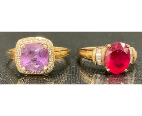 A Mexican pink topaz and diamond cluster ring, size V, stamped Mexico 10K, 3g gross;  diamond and smoky red ruby ring, size O