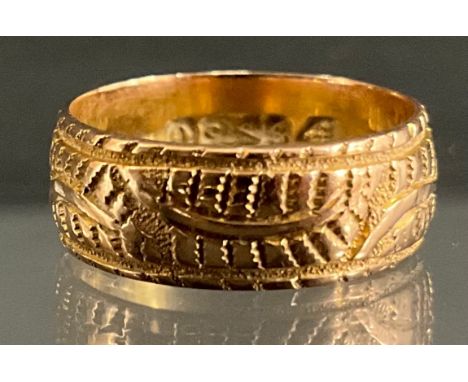 A 9ct Gold Patterned Wedding Band;stamped "9 375", width of the band is approx. 6.5mm wedding band size K 1/2 centre, total g