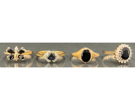A sapphire and diamond oval cluster ring, 9ct gold shank, size L, others Butterfly cluster, size K;  diamond lozenge, size N;