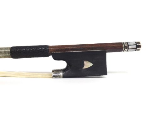 German silver and mother of pearl mounted violin bow by and stamped Gustav Prager and with the maker's trademark monogram arr