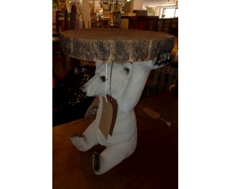 A contemporary lamp table in the form of a polar bear H52cm 
