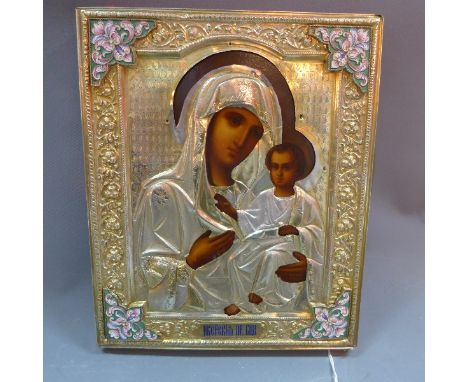 A Russian icon depicting The Mother of God and Christ, tempera on wood panel with gilt and enamel oklad, portrayed half-lengt