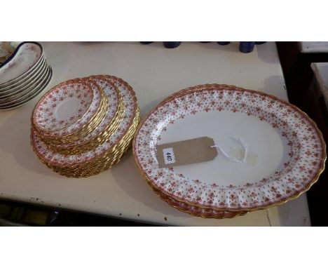 A Spode porcelain part dinner service, with fleur-de-lis design, red and gilt highlights 