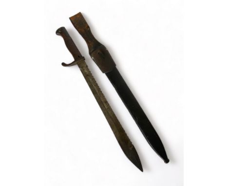 A Mauser WWI German sawbuck blade bayonet &amp; leather scabbard
Stamped WAFFENFABRICK MAUSER AG OBERNDORF, with a crown and 