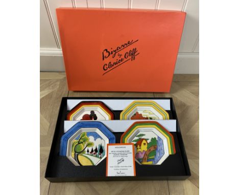 A boxed set of four octagonal Clarice Cliff Bizarre pattern plates by Wedgwood
In May Avenue, Orange Roof Cottage, Solitude a