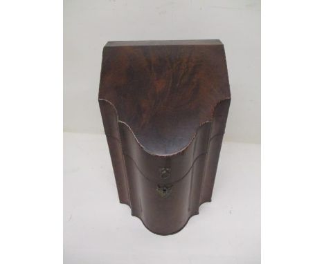 A George III boxwood and ebony inlaid mahogany knife box, the angled, hinged lid enclosing a fitted interior 