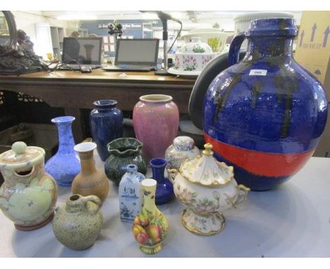 A selection of ceramic vases and jugs to include a large retro German pottery bottle vase, a Cantagalli blue and white vase, 