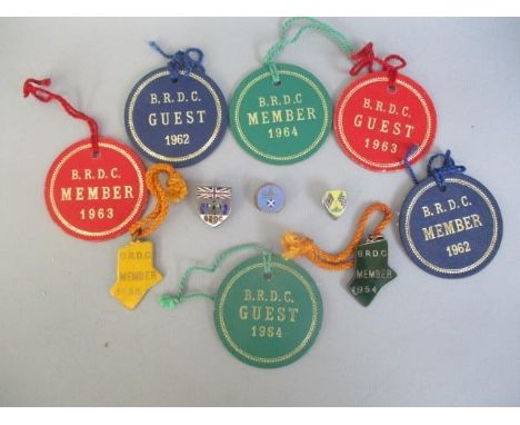 BRDC badges comprising of card member and guest badges for 1962, 1963 and 1964, two BRDC enamelled members badges for 1954 no