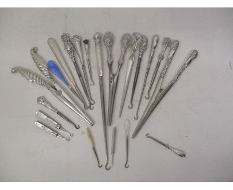 Silver collectibles to include, three glove stretchers, button hooks, a letter opener, a tooth pick and folding button hooks 