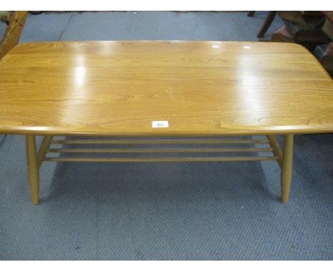 A retro Ercol elm coffee table with slatted shelf below 