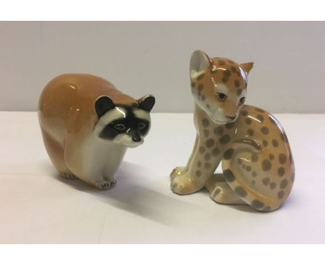 2 Lomonosov/USSR ceramic figurines. A racoon and a leopard.  