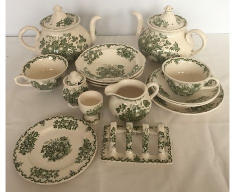 A quantity of Mason's green 'Fruit Basket' tea & breakfast wares. Comprising:- 2 teapots, toast rack, milk jug, 2 cups & sauc