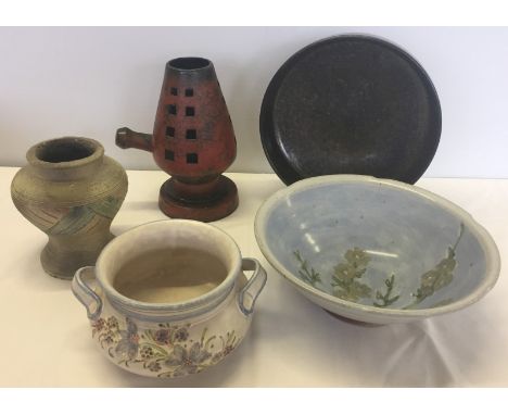 5 items of studio pottery. To include candle holder/lantern marked Kunst Nijverheid, Rotterdam, a metallic glaze fruit bowl &