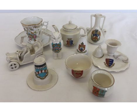 A quantity of ceramic crested ware items to include car, owl and candlestick. Including items from Sheringham, Gorlestone & G