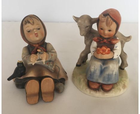 2 Goebel Hummel figurines of girls with headscarves. Model #182 "Good Friends" together with #69 "Happy Pastime". Tallest app