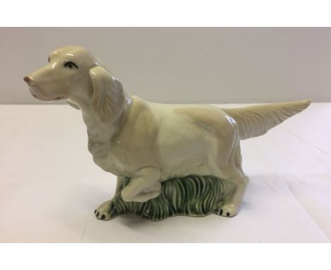 A large ceramic figurine of a setter dog, possibly USSR/Lomonosov.  