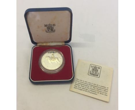 A boxed Silver Jubilee silver crown proof coin. In original case with leaflet. 