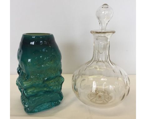 2 pieces of glass, a blue/green piece of studio glass together with a Victorian clear glass decanter  