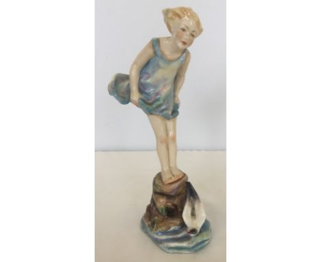 A Royal Worcester Figurine "Sea Breeze" depicting a girl paddling by the sea. Model #3008, modelled by Freda Doughty. Approx.