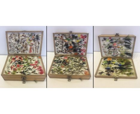 A light wooden box of vintage fishing flies. Approx. 500 to 600 flies. 
