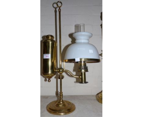 A brass student lamp with opaque white glass shade, 21"