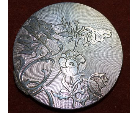 A continental '925' powder compact with engraved floral decoration