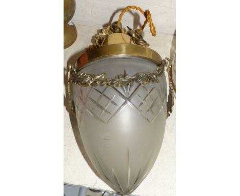 A frosted and cut glass hall light shade with brass floral swag mounts and ceiling roses, shade 7½"