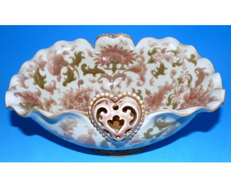 A Zsolnay Pecs bowl of folded oval form decorated with stylized flowers