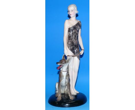 A Goldscheider Art Deco pottery figure of a young woman with Alsatian, the base marked Goldscheider, Wien, Made in Austria, L