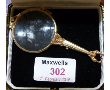 A 19th century spring action lorgnette