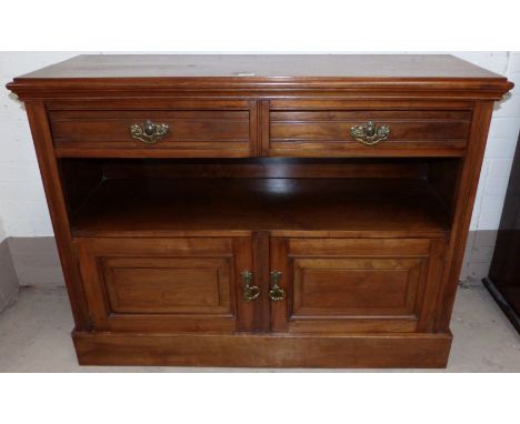 An Edwardian walnut sideboard of 2 drawers with cupboard under and central open shelf