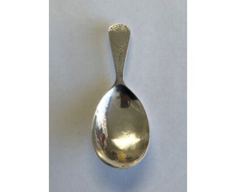 GEORGE III SILVER CADDY SPOON WITH BRIGHT CUT DECORATION LONDON MARKS RUBBED