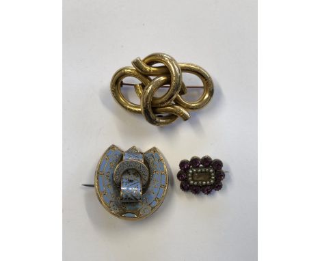 VICTORIAN PINCH BECK AMETHYST, SEED PEARL HAIR LOCKET BROOCH, ENTWINED KNOT BROOCH AND HORSESHOE BELT BUCKLE ENAMEL BROOCH 
