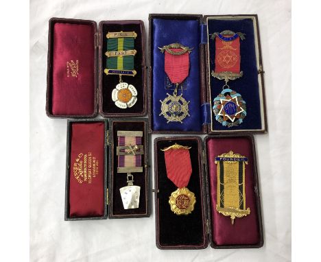 FIVE CASED ROYAL ORDER OF BUFFALO SILVER AND GILT ENAMEL MEDALLIONS