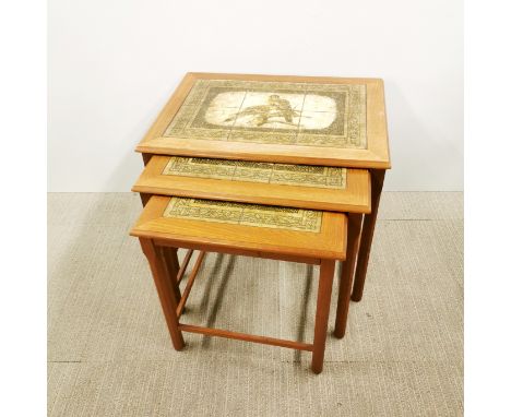 A mid century teak and tile topped nest of three tables, largest 56 x 48 x 40cm.