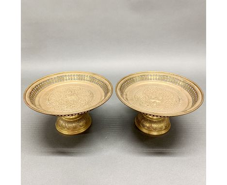 Two Siamese hammered brass Buddhist offering stands, Dia. 20cm H. 10cm.