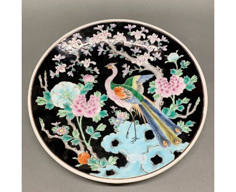 A mid 20thC Chinese hand enamelled porcelain charger, Dia. 37cm.