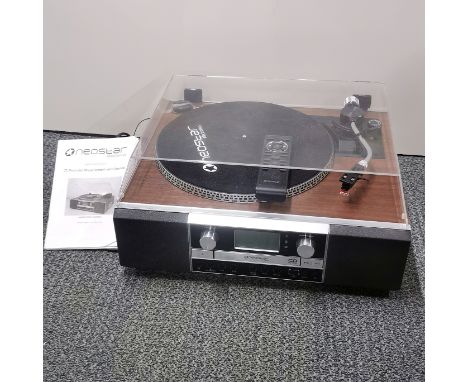 A Scotts &amp; Co Neostar Electronics record player and CD player with remote.