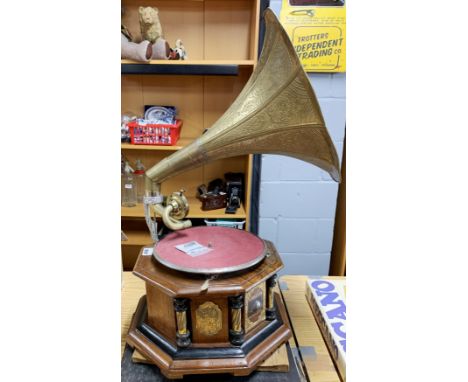 An old reproduction wind up gramophone, H. 67cm. Together with a group of 78RPM records.