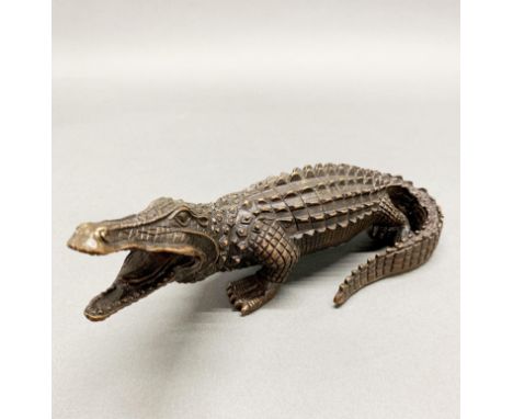 A detailed bronze model of a crocodile, L. 25cm.